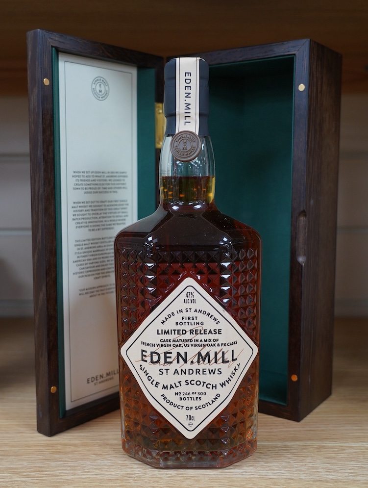 An oak cased bottle of Eden Mill first bottling single malt whisky No. 246 of 300. Condition - good